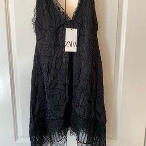 ZARA NWT SMALL little black dress. Beautiful lace detail neckline and hemline.
